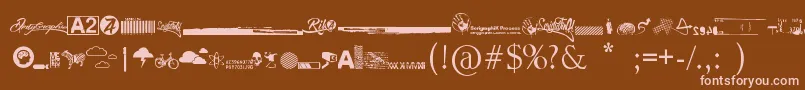 R74 Dingbat attak-fontti – vaaleanpunaiset fontit ruskealla taustalla