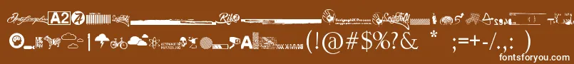 Czcionka R74 Dingbat attak – białe czcionki na brązowym tle