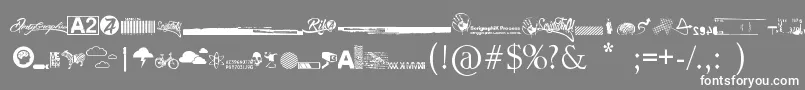 R74 Dingbat attak-fontti – valkoiset fontit harmaalla taustalla