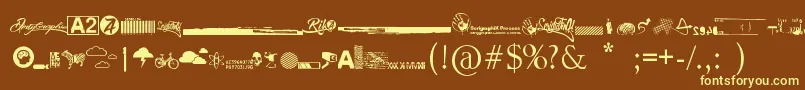 R74 Dingbat attak-Schriftart – Gelbe Schriften auf braunem Hintergrund