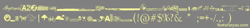 R74 Dingbat attak Font – Yellow Fonts on Gray Background