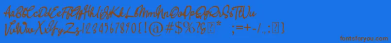 RA BALI Font – Brown Fonts on Blue Background