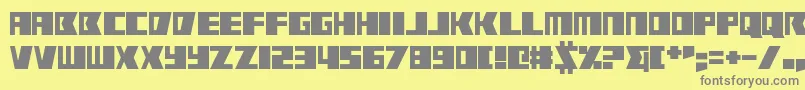 Rabbit Fire-fontti – harmaat kirjasimet keltaisella taustalla