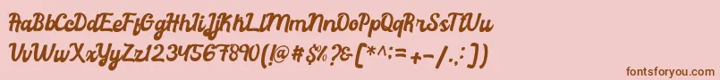 Więcej informacji o czcionce Rachael Script Czcionka Rachael Script – brązowe czcionki na różowym tle