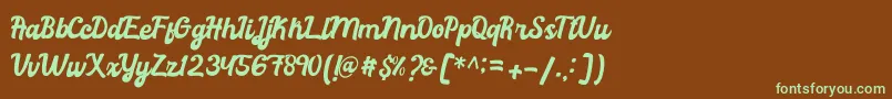 フォントRachael Script – 緑色の文字が茶色の背景にあります。