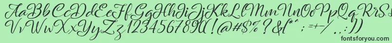 Rachella Font – Black Fonts on Green Background