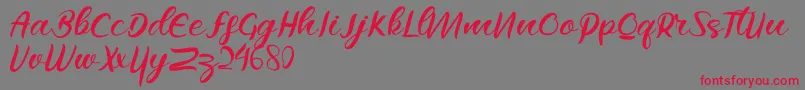 Raflesya-Schriftart – Rote Schriften auf grauem Hintergrund