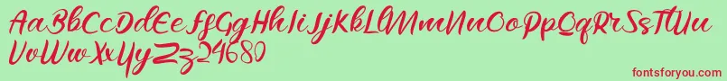 Raflesya Font – Red Fonts on Green Background