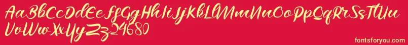 Raflesya Font – Yellow Fonts on Red Background