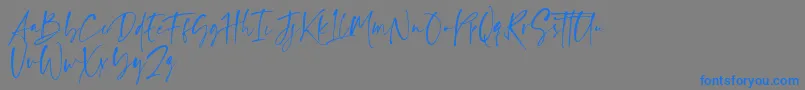 Ragland Font – Blue Fonts on Gray Background