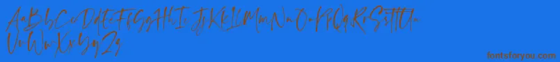 Ragland-Schriftart – Braune Schriften auf blauem Hintergrund