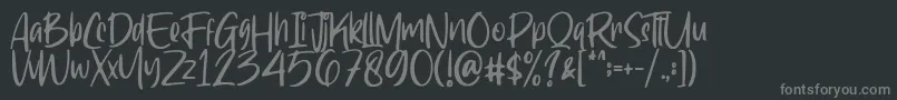 Шрифт Ragnarock Demo – серые шрифты на чёрном фоне