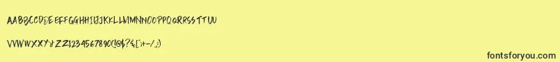 フォントRain Brush Dafont – 黒い文字の黄色い背景