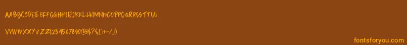 Шрифт Rain Brush Dafont – оранжевые шрифты на коричневом фоне