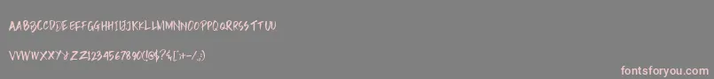 フォントRain Brush Dafont – 灰色の背景にピンクのフォント