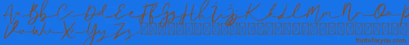Ralisto Font – Brown Fonts on Blue Background