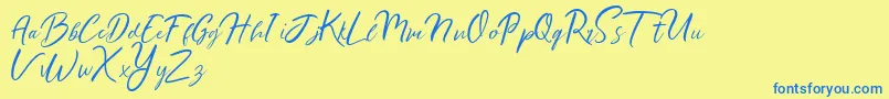 Ralyne Demo Font – Blue Fonts on Yellow Background