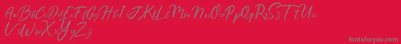 Ralyne Demo Font – Gray Fonts on Red Background