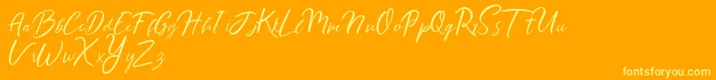 Ralyne Demo-Schriftart – Gelbe Schriften auf orangefarbenem Hintergrund