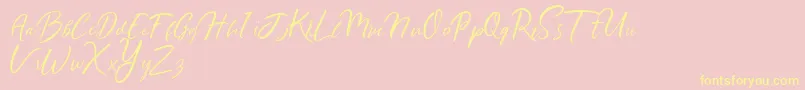 Ralyne Demo Font – Yellow Fonts on Pink Background