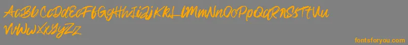 Rampage Kid-Schriftart – Orangefarbene Schriften auf grauem Hintergrund