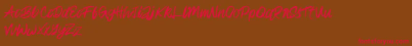 Rampage Kid-Schriftart – Rote Schriften auf braunem Hintergrund