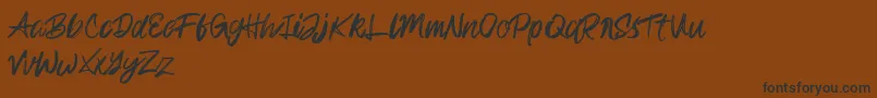 Lisätietoja Rampage Kid-fontista Rampage Kid-fontti – mustat fontit ruskealla taustalla