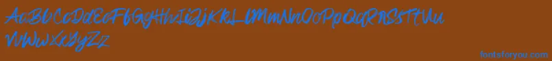 Rampage Kid Font – Blue Fonts on Brown Background