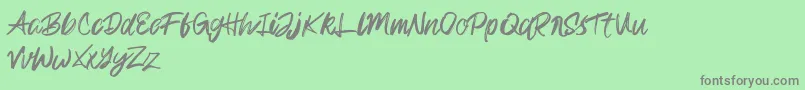 Więcej informacji o czcionce Rampage Kid Czcionka Rampage Kid – szare czcionki na zielonym tle