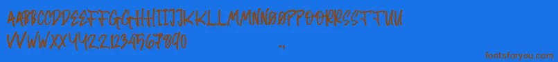 Random Brush Font – Brown Fonts on Blue Background