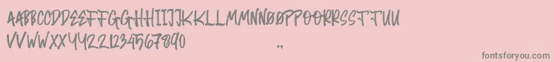 Random Brush-Schriftart – Graue Schriften auf rosa Hintergrund