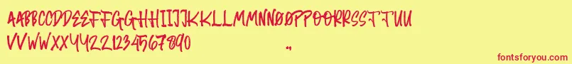 Random Brush Font – Red Fonts on Yellow Background