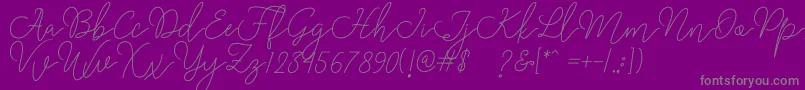 Fonte Rangga Script – fontes cinzas em um fundo violeta