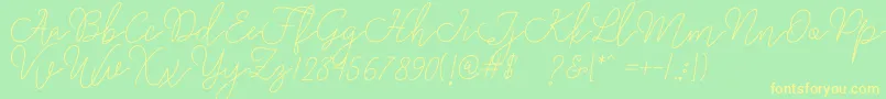 Rangga Script Font – Yellow Fonts on Green Background