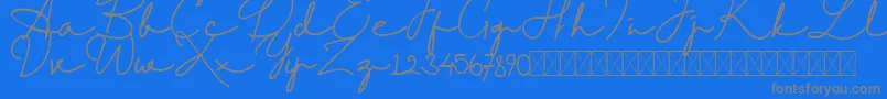RantcaFreeRegular-Schriftart – Graue Schriften auf blauem Hintergrund