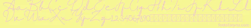 RantcaFreeRegular Font – Pink Fonts on Yellow Background