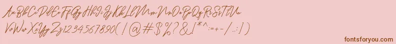 フォントRanuella – ピンクの背景に茶色のフォント