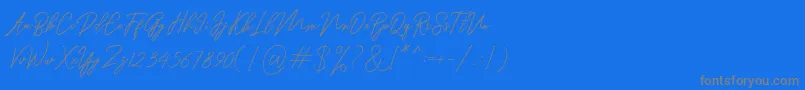フォントRanuella – 青い背景に灰色の文字