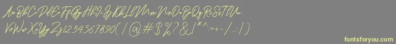 Ranuella Font – Yellow Fonts on Gray Background