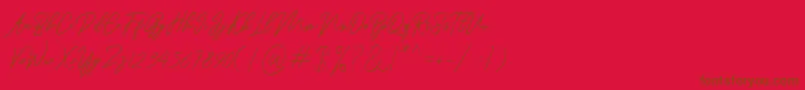 Ranuella Font – Brown Fonts on Red Background