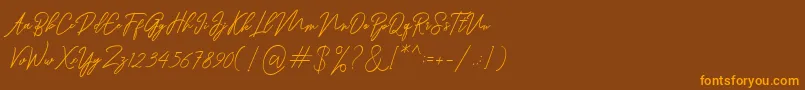Ranuella Font – Orange Fonts on Brown Background