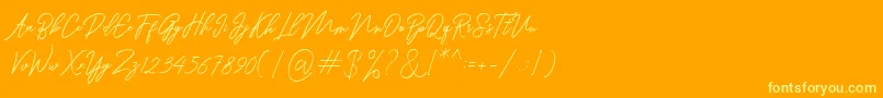 Шрифт Ranuella – жёлтые шрифты на оранжевом фоне