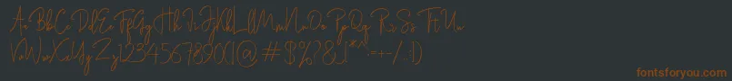 Rasendrya-fontti – ruskeat fontit mustalla taustalla