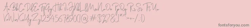 Rasendrya-fontti – harmaat kirjasimet vaaleanpunaisella taustalla