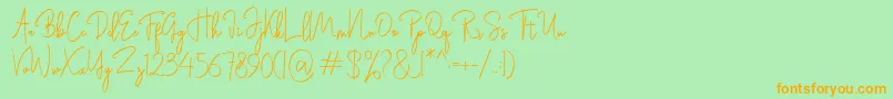 Rasendrya Font – Orange Fonts on Green Background