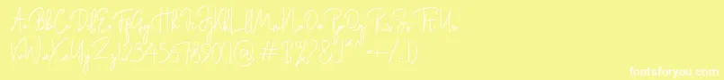 Шрифт Rasendrya – белые шрифты на жёлтом фоне