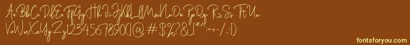 Rasendrya-fontti – keltaiset fontit ruskealla taustalla