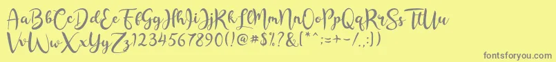 Rashida Script Font – Gray Fonts on Yellow Background