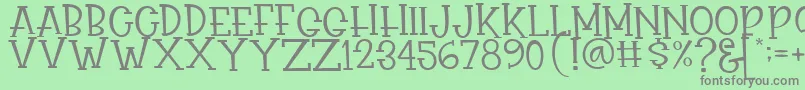 Rasionil Font – Gray Fonts on Green Background