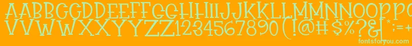 Rasionil Font – Green Fonts on Orange Background